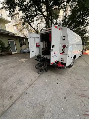 Magnet Plumbing service vehicle on-site for Water Heater Repair in Fountainebleau